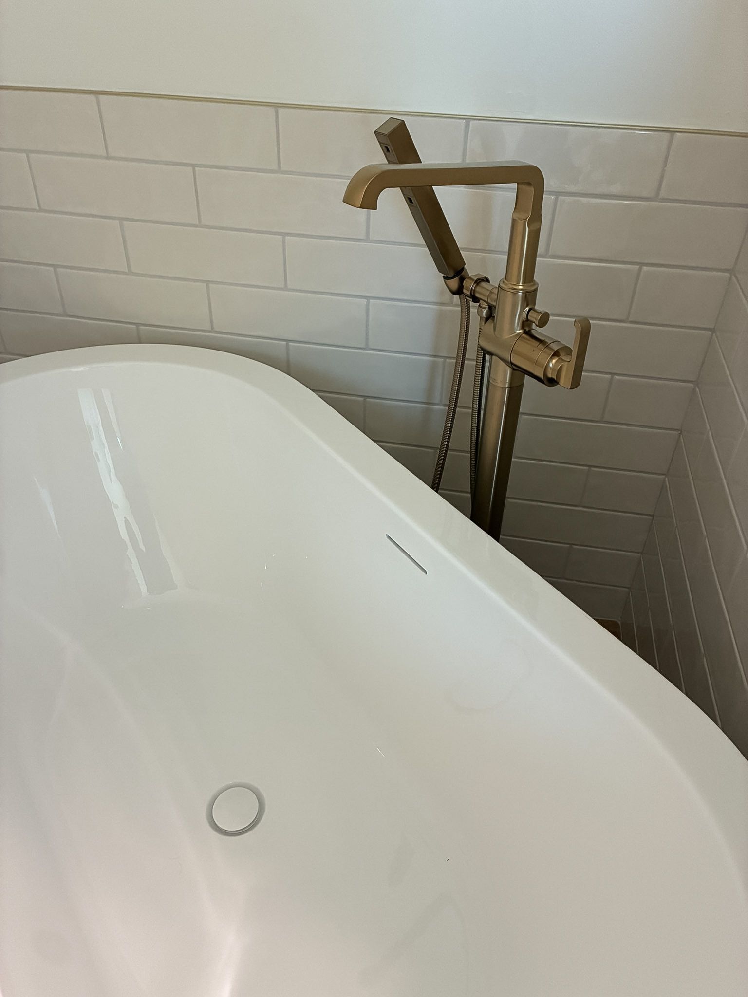 Soaking tub and tile detail in a Lee's Summit bathroom remodel by Resurrection Homes.