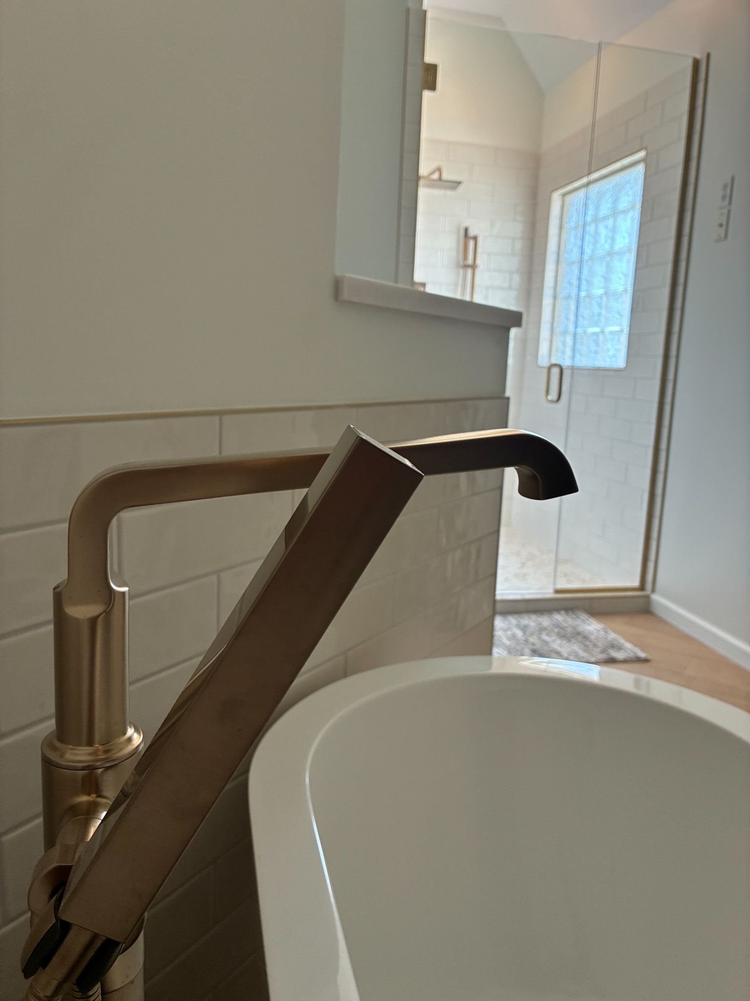 Bathtub faucet and finish detail in a Lee's Summit bathroom remodel.