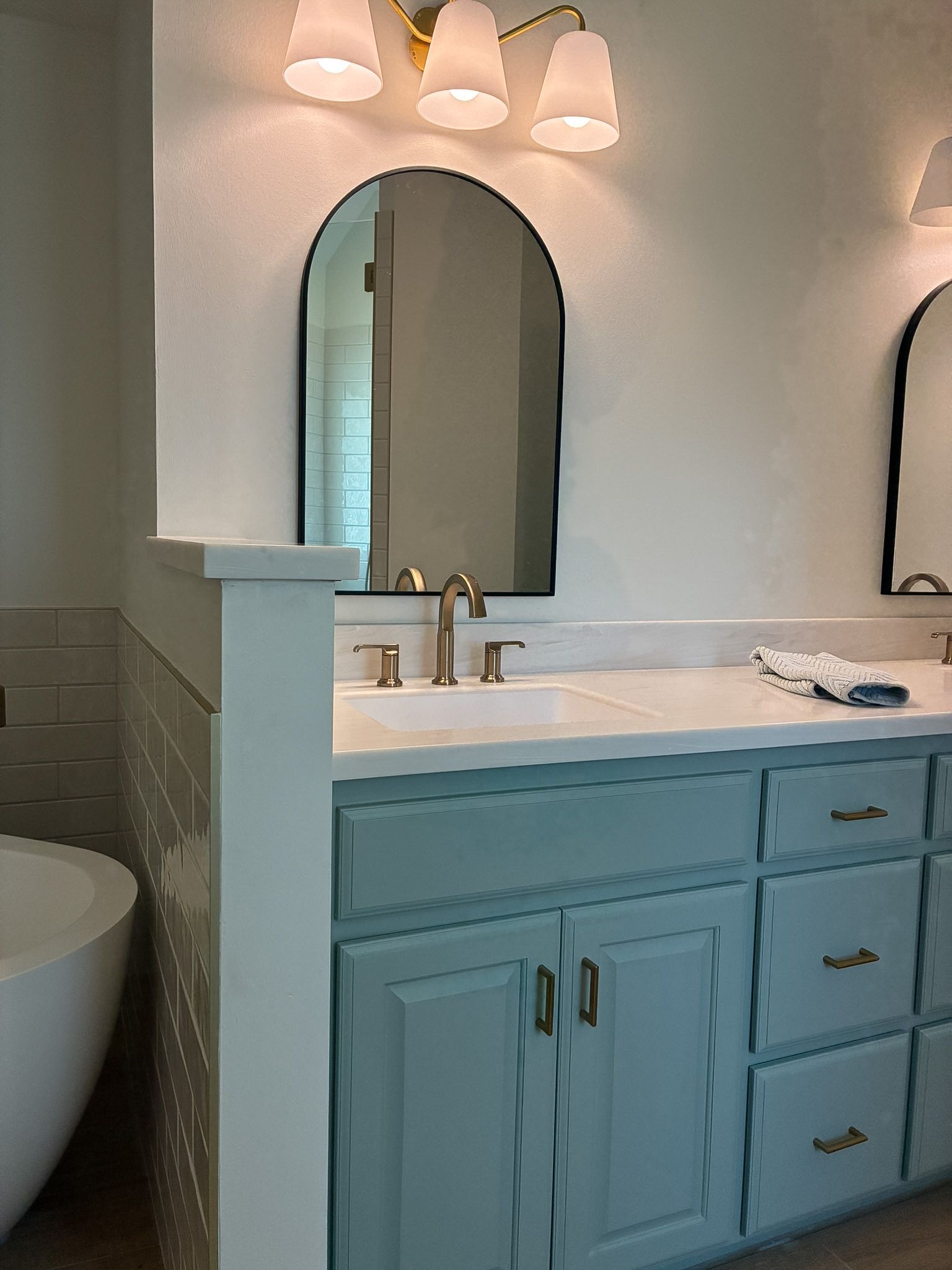 Custom vanity in a Lee's Summit bathroom remodel by Resurrection Homes.