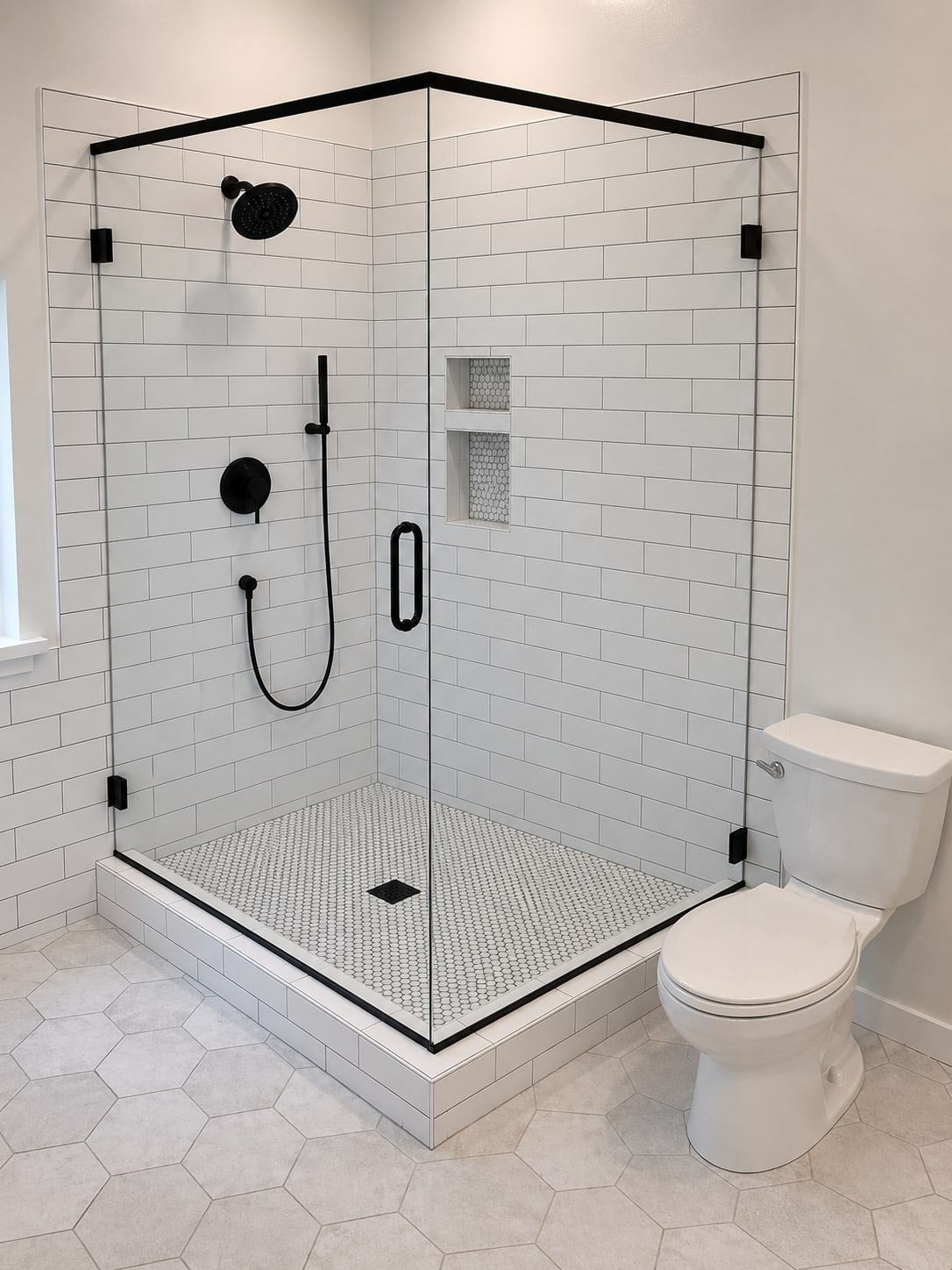 Walk-in shower in a Prairie Village bathroom remodel by Resurrection Homes.